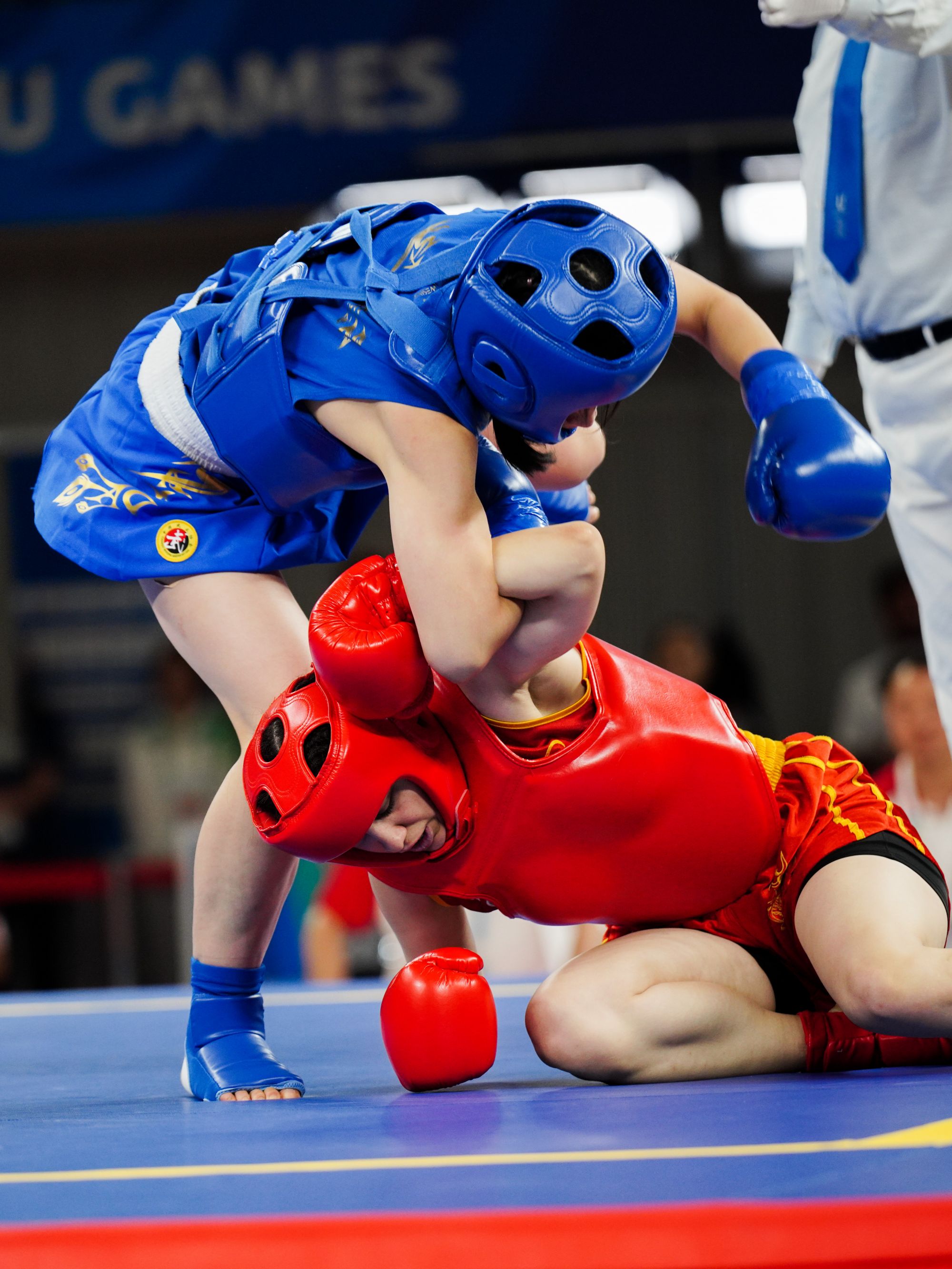8月3日，武术散打女子60公斤级决赛，中国选手李志勤2：0击败土耳其选手夺得金牌。摄影：张翔升