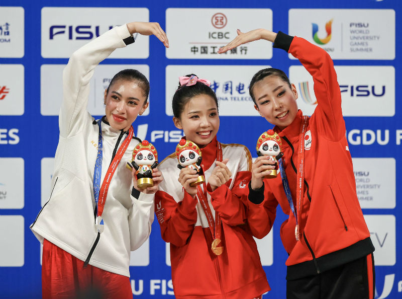 7月30日，女子太极剑，中国选手陈小丽（中）获得金牌、文莱选手LACHKAR Basma（左）获得银牌、日本选手庄司理濑（右）获得铜牌。